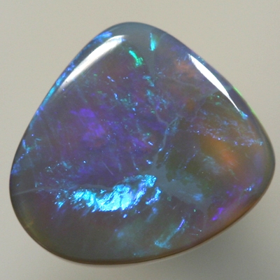 SOLID SEMI BLACK OPAL Bright rolling flashes of green, turquosie and peacock blue